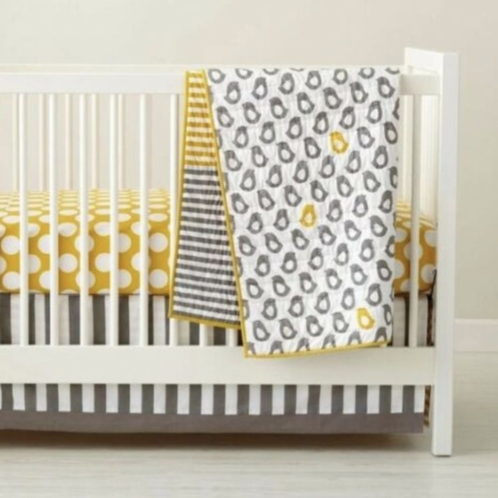 The Land of Nod Not A Peep Quilt And Yellow Polka Dot Fitted Crib Sheet